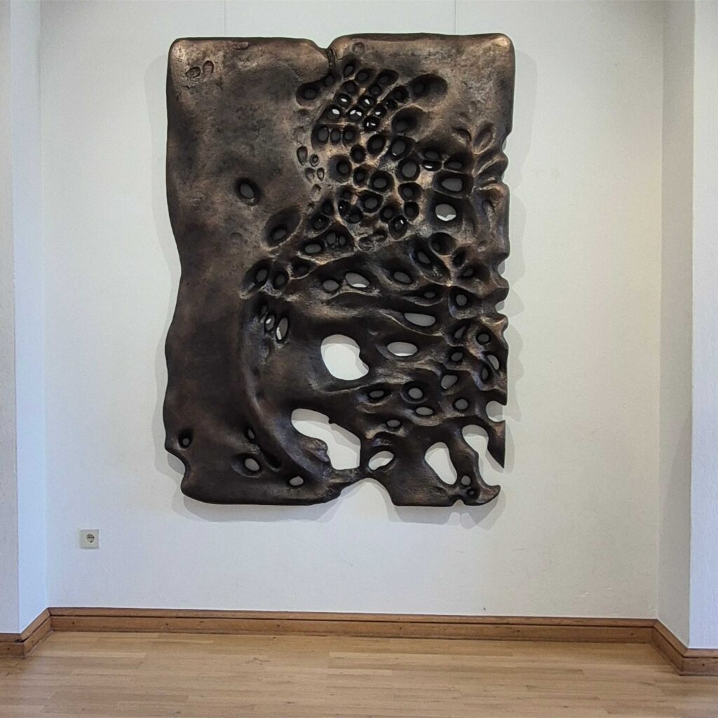 Groot bronskleur reliefpaneel